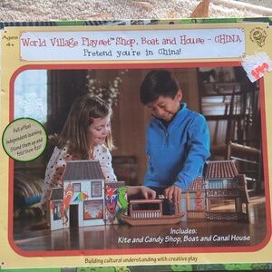 World Village Playset shop, boat, and house